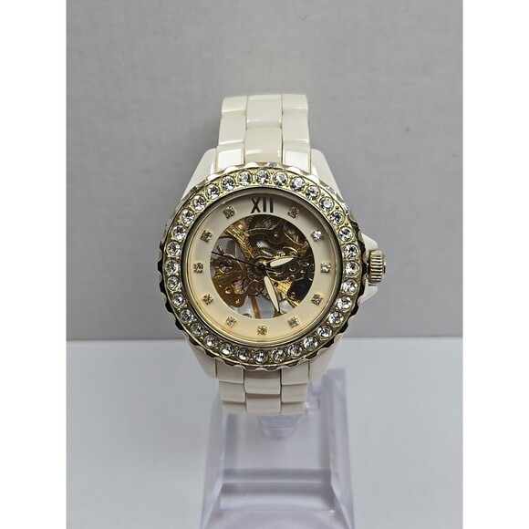 Adrienne Vittadini Accessories - Womens Rare Adrienne Beige Ceramic Skeleton Crystal Bezel Manual Wind Watch